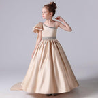 Elegant Champagne Gold Fairytale Gown Asymmetric Design Luxurious Girl's Gown for a Classy Look Trailing Elegance - Highlight Every Graceful Moment