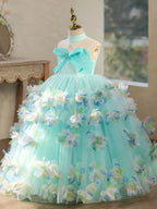 Children's maxi dresses, floral dresses, wedding flower girl dresses, birthday party dresses for babies, and princess dresses for girls at prom photoshoots.