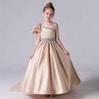 Elegant Champagne Gold Fairytale Gown Asymmetric Design Luxurious Girl's Gown for a Classy Look Trailing Elegance - Highlight Every Graceful Moment