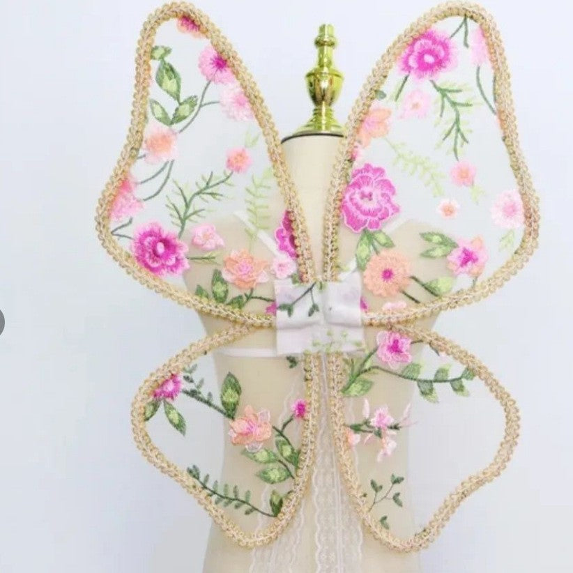 Paired with a floral dress, butterfly wings, floral butterfly wings