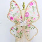 Paired with a floral dress, butterfly wings, floral butterfly wings