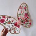 Paired with a floral dress, butterfly wings, floral butterfly wings