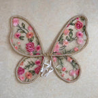 Paired with a floral dress, butterfly wings, floral butterfly wings