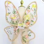 Paired with a floral dress, butterfly wings, floral butterfly wings
