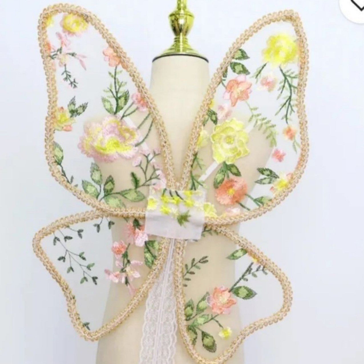 Paired with a floral dress, butterfly wings, floral butterfly wings