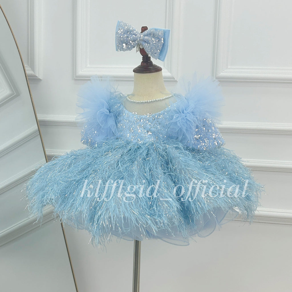 Baby blue sequin princess tutu dress for girls with voluminous feather-effect skirt, puff sleeves and matching bow headpiece