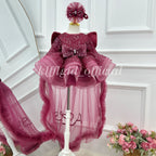 Front view of a burgundy girls' butterfly wing birthday dress with sparkling sequin embellishments, puffed shoulders, a decorative waist bow, and a layered tulle skirt with long sheer panels.