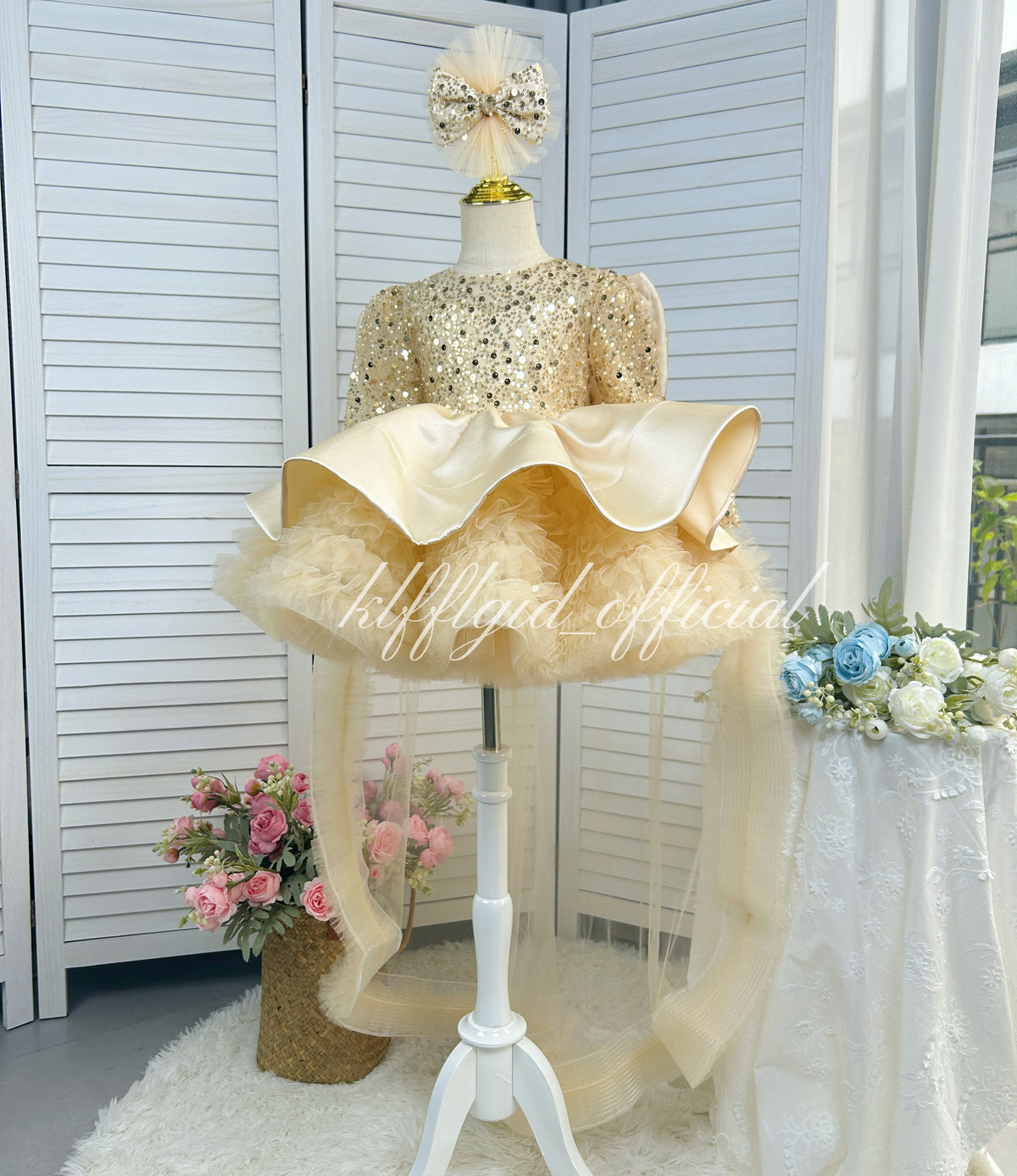 Champagne sparkly princess dress for girls with satin bow and layered tulle skirt front view