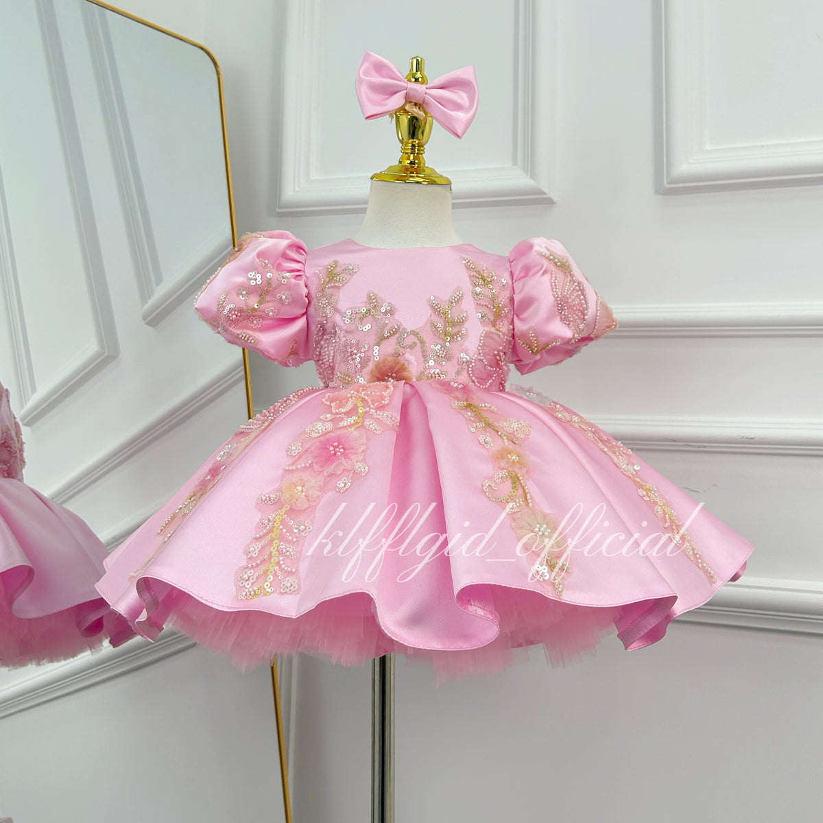Pink satin princess dress for girls with puff sleeves, floral sequin embroidery and a full flared skirt