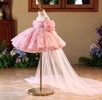 Side view of pink floral tulle princess dress for girls with layered skirt and long flowing train
