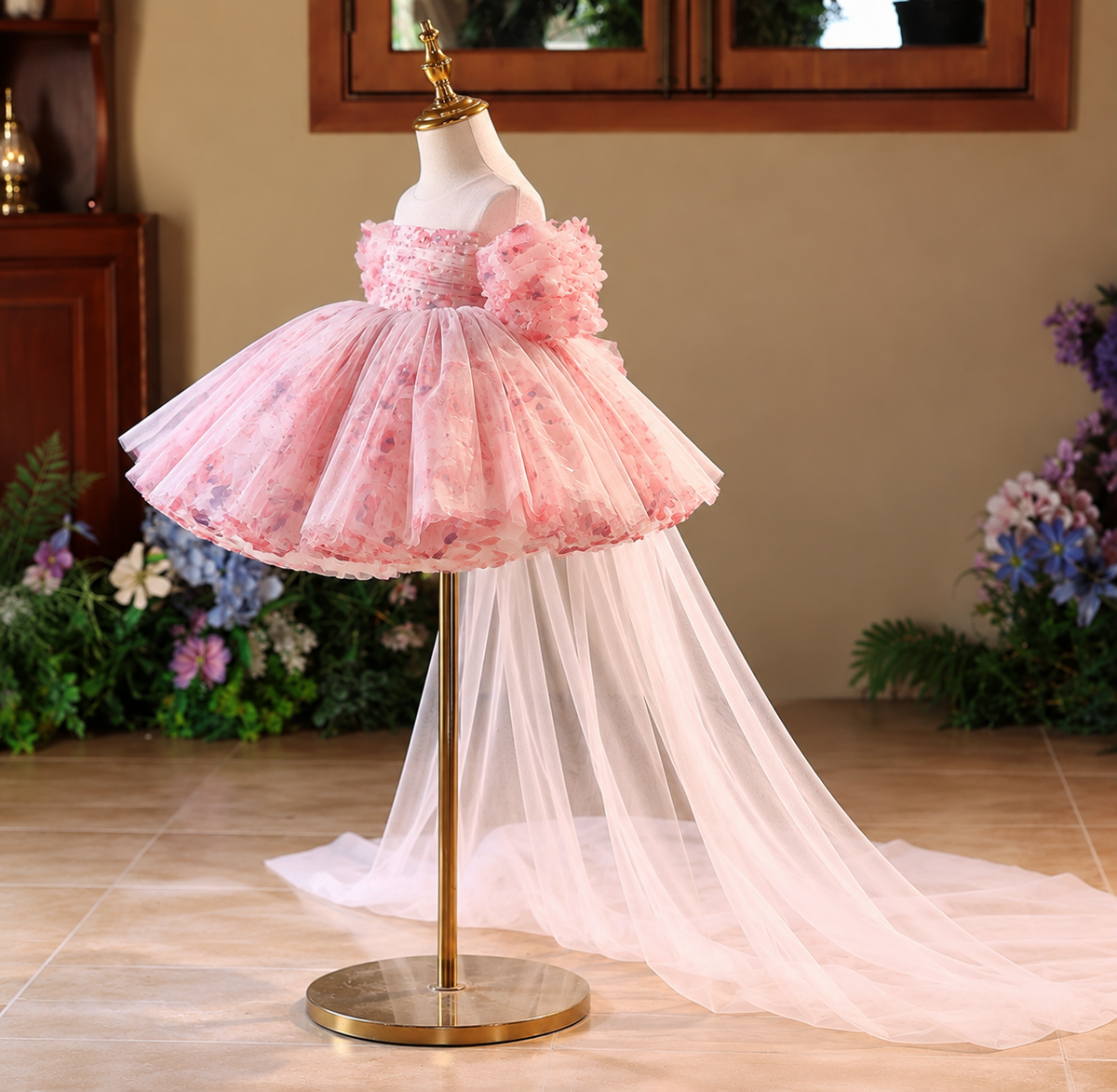 Side view of pink floral tulle princess dress for girls with layered skirt and long flowing train