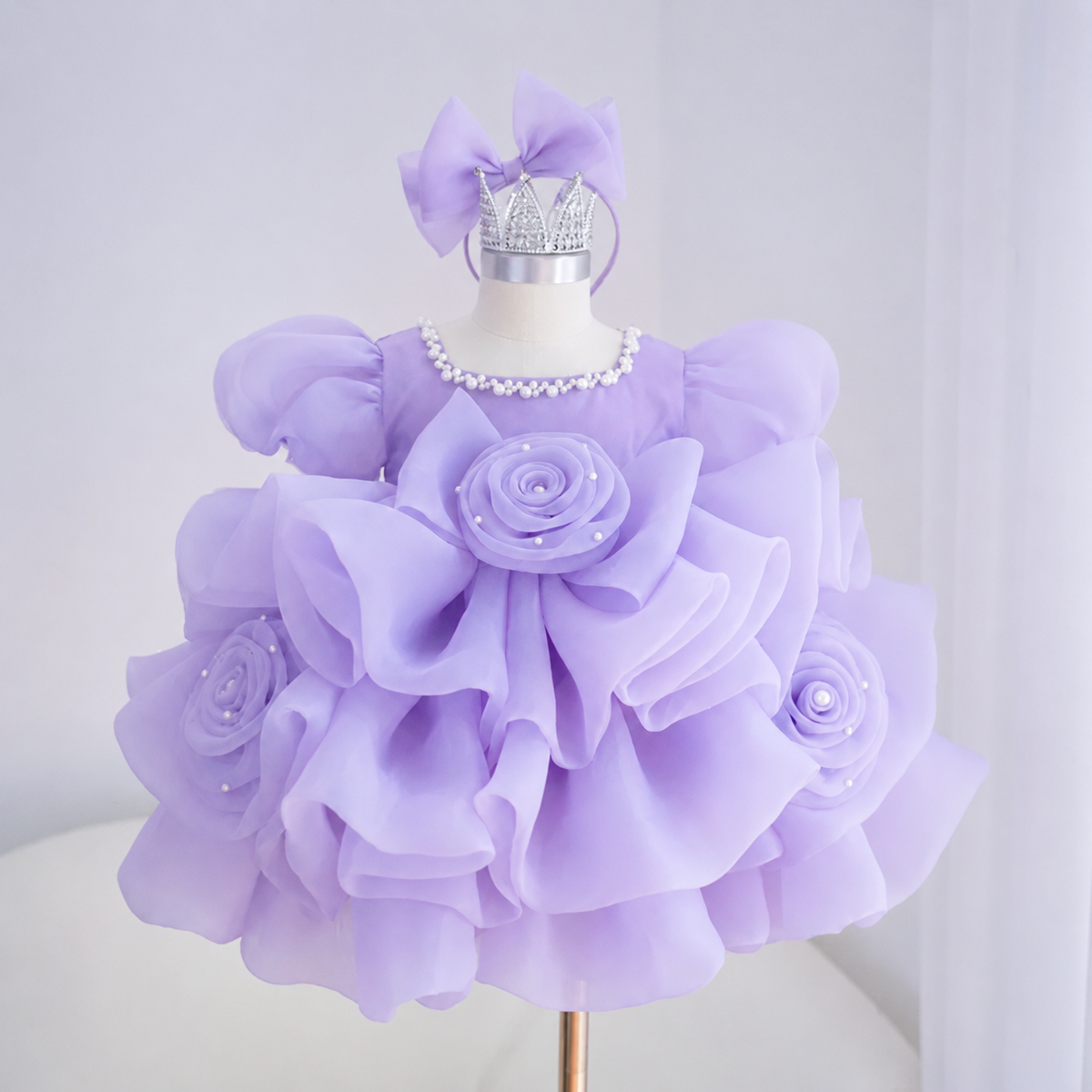 Purple girls princess dress with layered ruffle skirt, 3D rose decorations, pearl neckline and matching bow headpiece