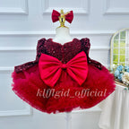 Red girls princess dress with large satin back bow and layered tulle skirt back view