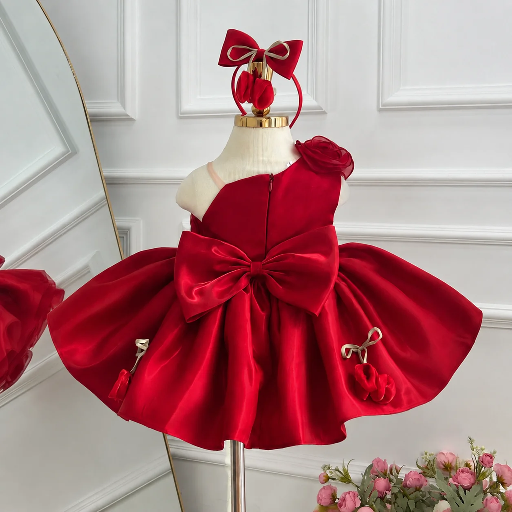 Red princess dress for girls with large back bow and full satin skirt back view