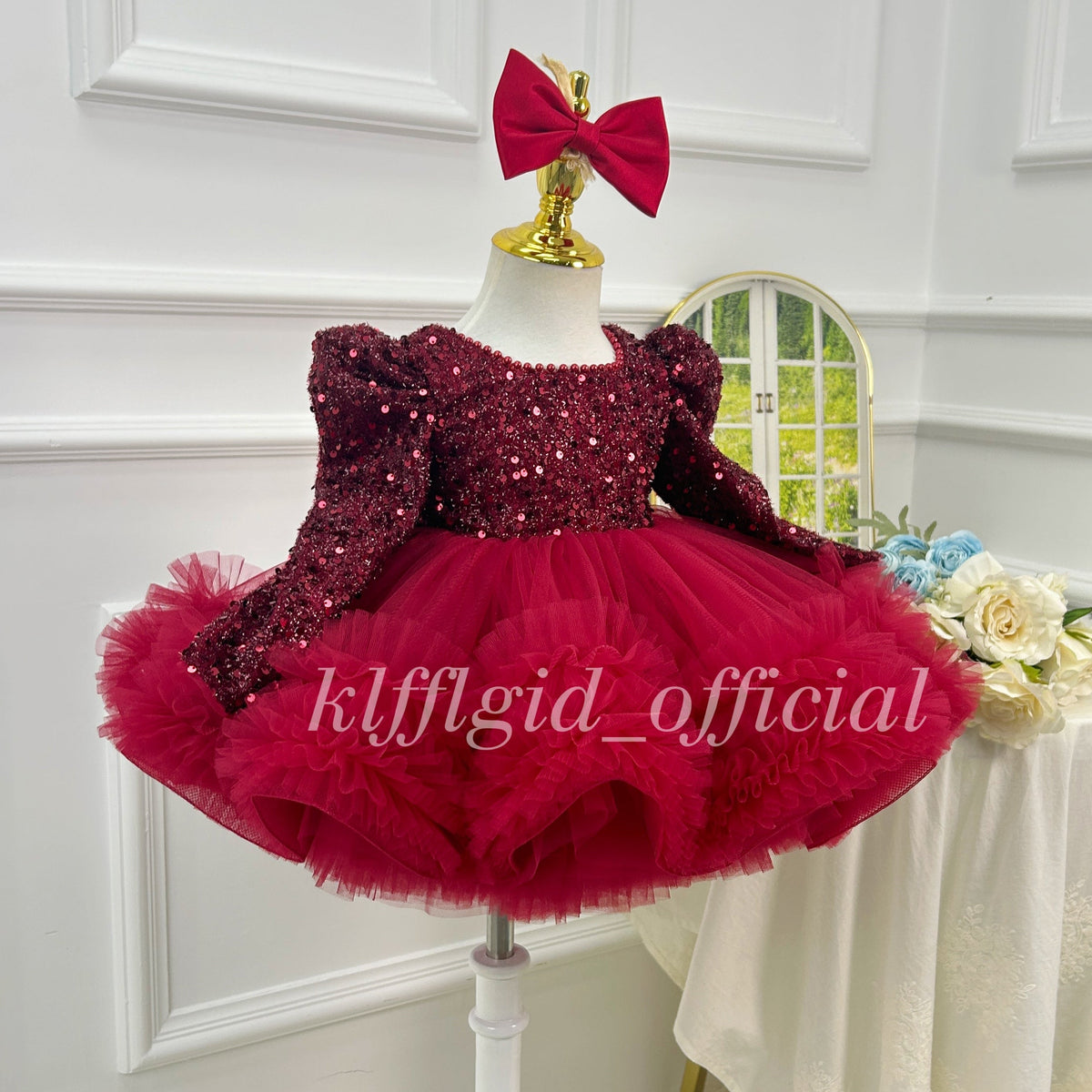 Red sparkly girls princess dress with ruffled tulle skirt and floral sheer panels side angle