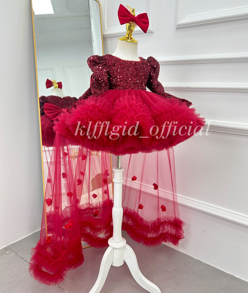 Red sparkly princess dress for girls with sequin bodice and layered tulle skirt three-quarter view