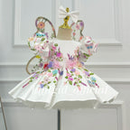 White princess dress for girls with colorful floral embroidery and layered flower waist detail