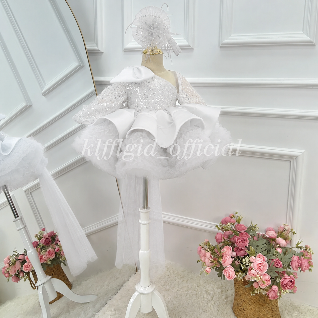White girls princess dress with sequin details, layered tulle skirt and elegant train front view